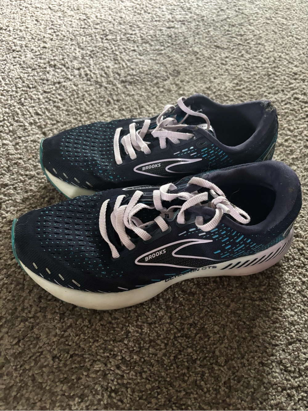 Brooks Navy Running Shoes with Teal Accents and Light Pink Laces